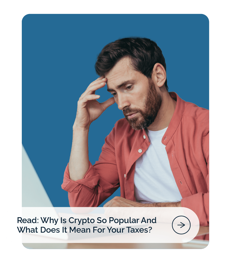 A man stressed looking at his computer trying to figure out how cryptocurrency affects his taxes