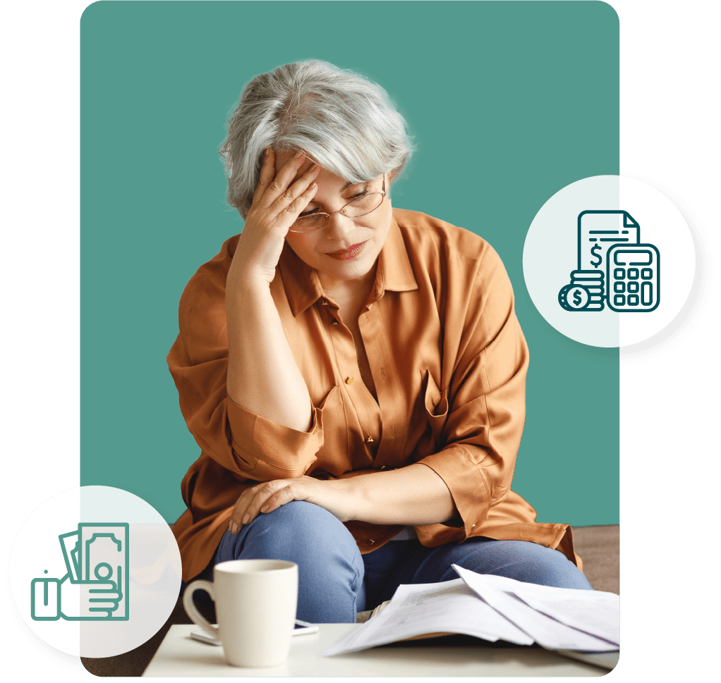 A woman with her head in her hand while reviewing her Trust Fund Recovery Penalty